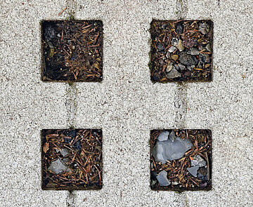 Das Bild zeigt ein Lochsteingitter welches als wasserdurchlässiger Bodenbelag eingesetzt wird.