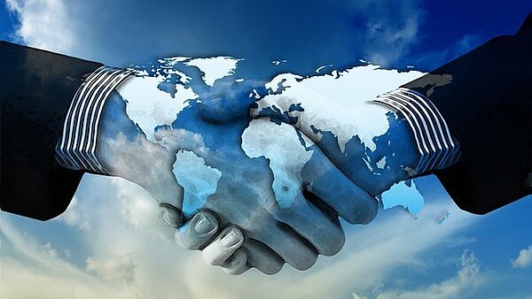 Symbolbild mit Handschlag